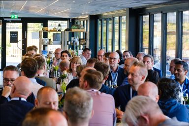 myConf participants having dinner together